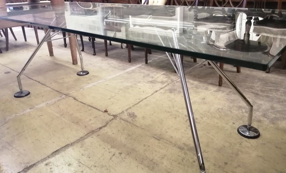 A Norman Foster Techno Nomos glass top table, W.220cm, D.100cm, H.71cm